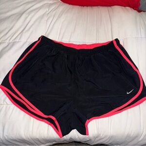 Nike Black and Pink Athletic Shorts with Curved Hem